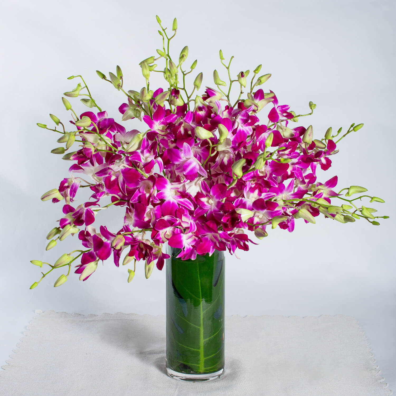 Blooming in Success table arrangement - Prince Flower Shop