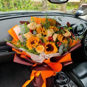 Sunset Bouquet in a car